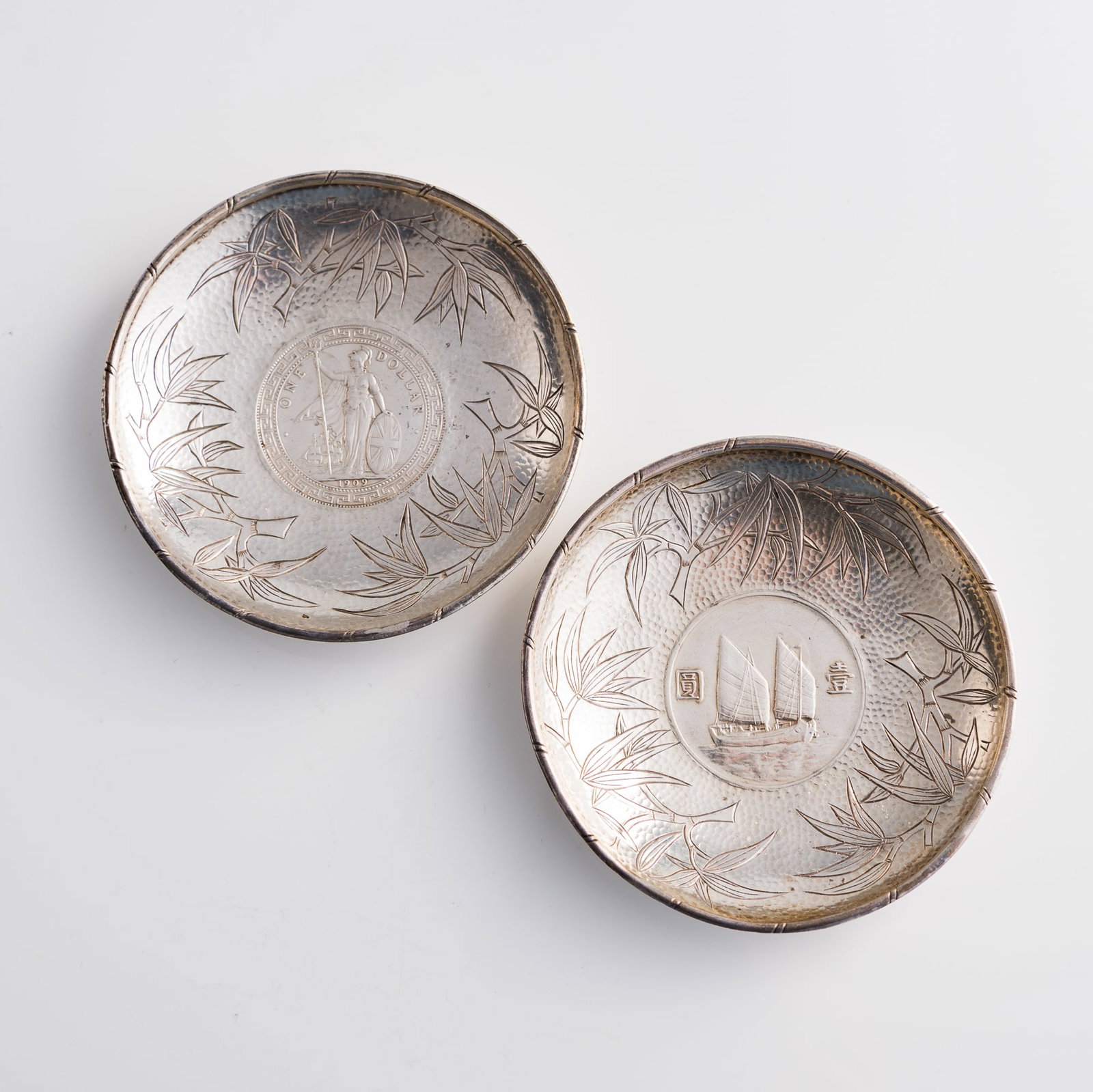 Two silver dishes inset with Chinese silver coins: Two silver dishes inset with Chinese silver coins Dish: H: 1/2, Dia: 3 3/4 in. (H: 1.3, Dia: 9.5 cm. (each)) Coin Diameter: 39.1 mm and 38.8 mm Weight: 71.65 g and 71.74 g Private collector, Atlanta, 