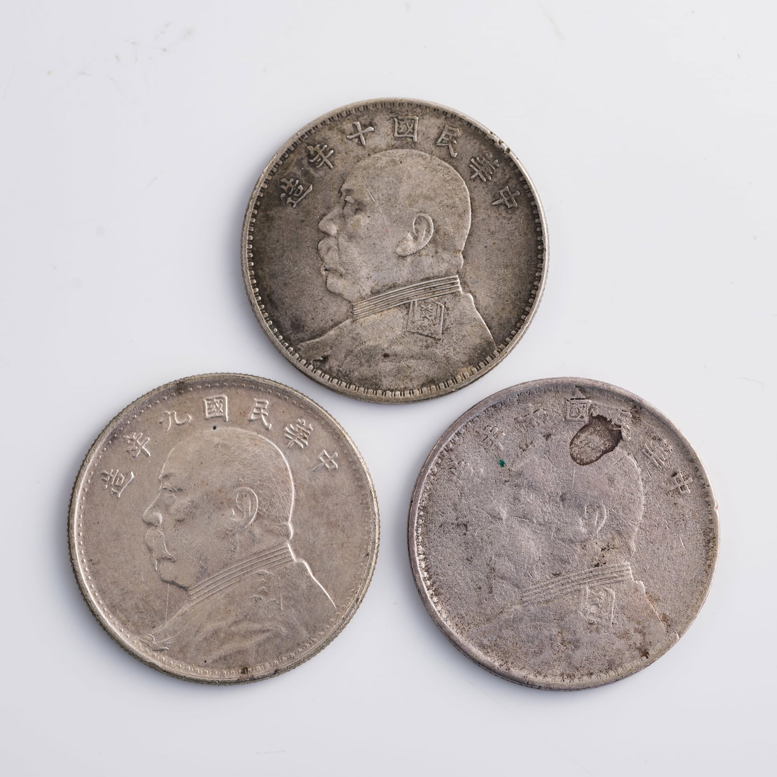 Three Chinese 'Yuan Shikai' portrait silver dollars, 1920 and 1921 (1 of 9)