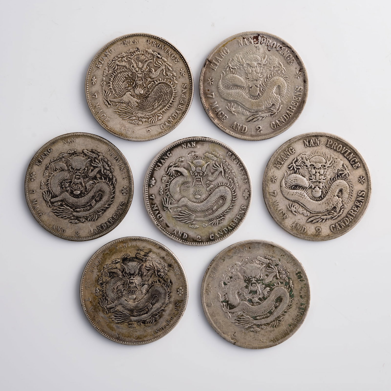 Seven Guangxu Yuanbao Kuping 7 mace 2 candareen silver dollars, Jiangnan Province Mint, 1898-1904 (1 of 9)