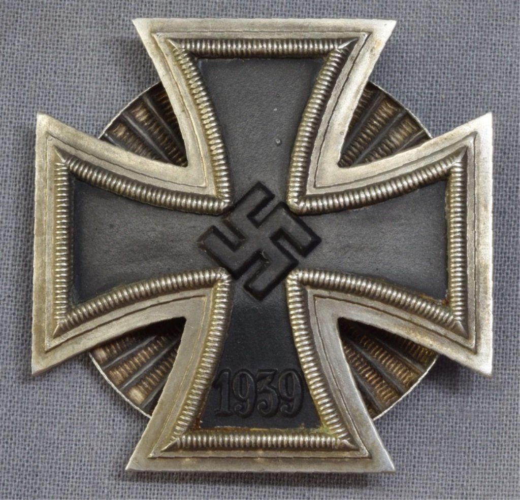 German World War II 1st Class Iron Cross: German World War II 1st Class Iron Cross. Has a clam shell screw back. Three piece construction with an iron magmatic center.