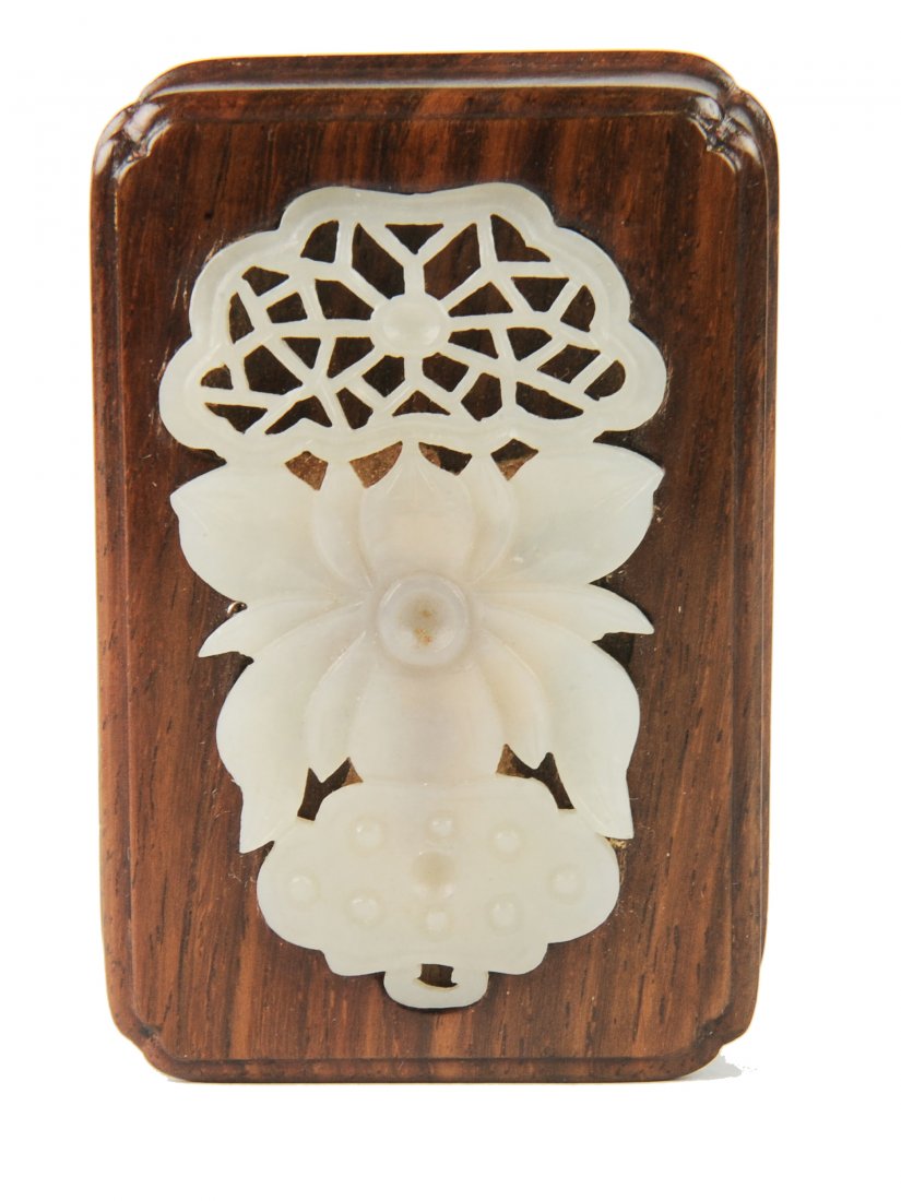 Paper Weight with a 19th Century White Jade Plaque: A Chinese Wood Paper Weight with a 19th Century White Jade Plaque This beautifully grained wood paper weight is inlaid with a carved and pierced white jade plaque in the shape of a lotus flower. The w