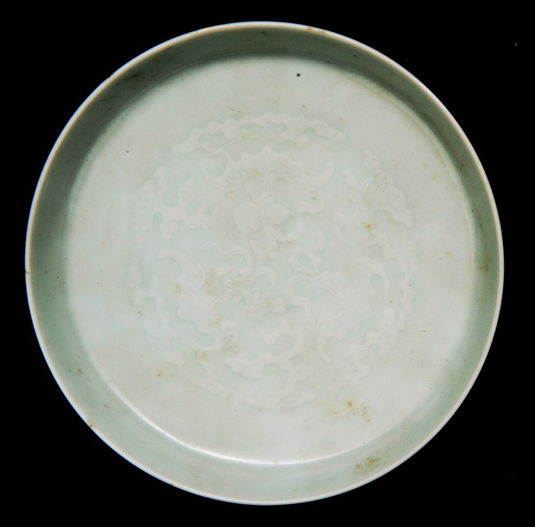 Imperial Celadon Brush Washer, Qianlong Period: A Chinese Imperial Celadon Brush Washer, Qianlong Mark, and of the Period (1736-1795) This shallow brush washer has tapered sides that rise from a straight ring foot. The interior is finely molded, cr