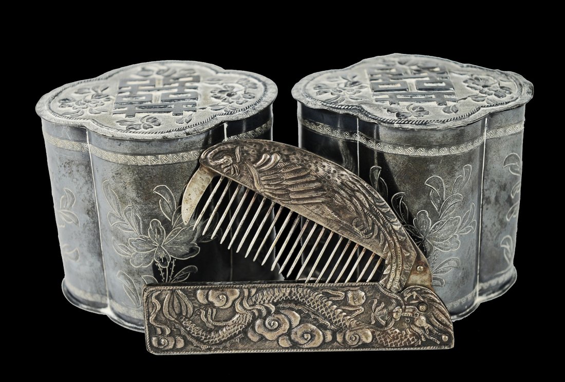 Pair of Silver Covered Boxes with a Silver Comb: A Pair of Chinese Silver Covered Boxes with a Silver Comb, Qing Dynasty (1644-1911) The boxes have both carved and etched floral designs and a makers mark. The comb, which folds in half, has a dragon 