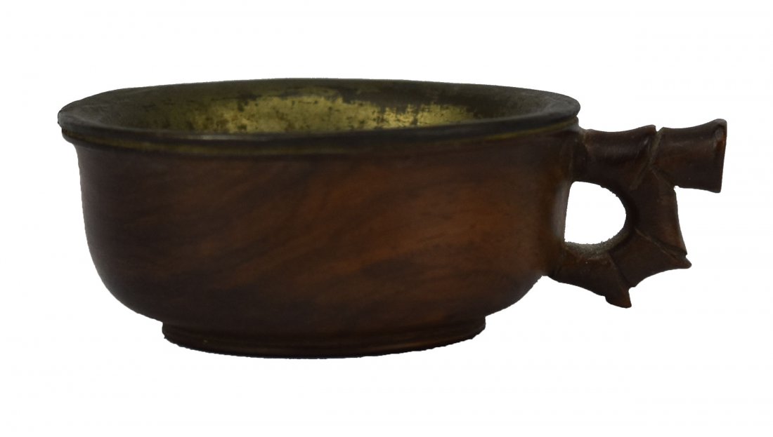 Huanghuali Cup & a Bronze Seal with a Beast Finial: A Small Chinese Huanghuali Cup and a Bronze Seal with a Beast Finial, Ming Dynasty (1368-1644) This Huanghuali cup is carved with a bamboo shaped handle. It has a brass insert fitted into it. The bron