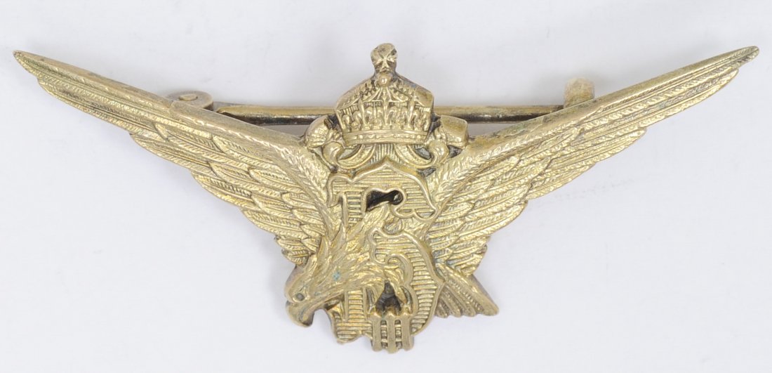 German Bulgarian WWII Luftwaffe Axis Pilot Wing: German Bulgarian WWII Luftwaffe Axis Pilot Wing. Measures 25/16' wide. Has a thin horizontal pin back. One piece brass construction. Condition: Excellent condition. Note: Some items in this sale may c