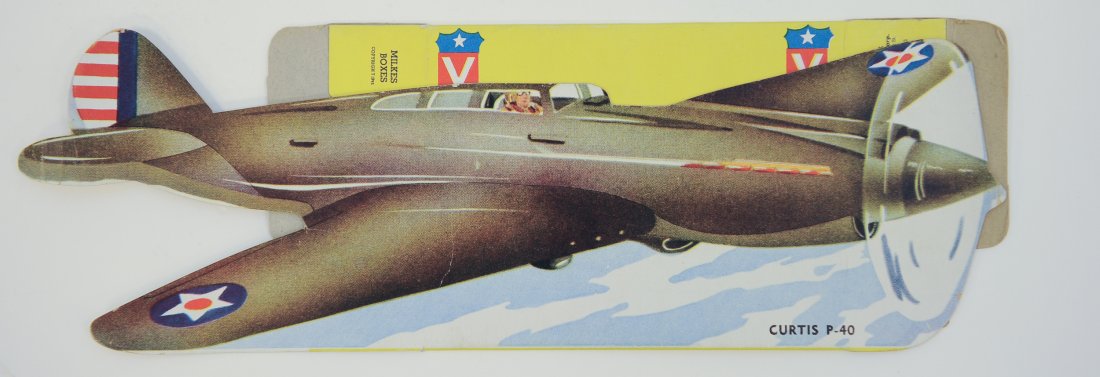 Curtis P-40 Milkes Company Candy Box: Curtis P-40 Milkes Company Candy Box Die-Cut (R-190), 1942. The Curtis P-40 Milkes Company candy box is one of a six piece set of the 1942 "American Defenders" series. The flattened candy box is prese