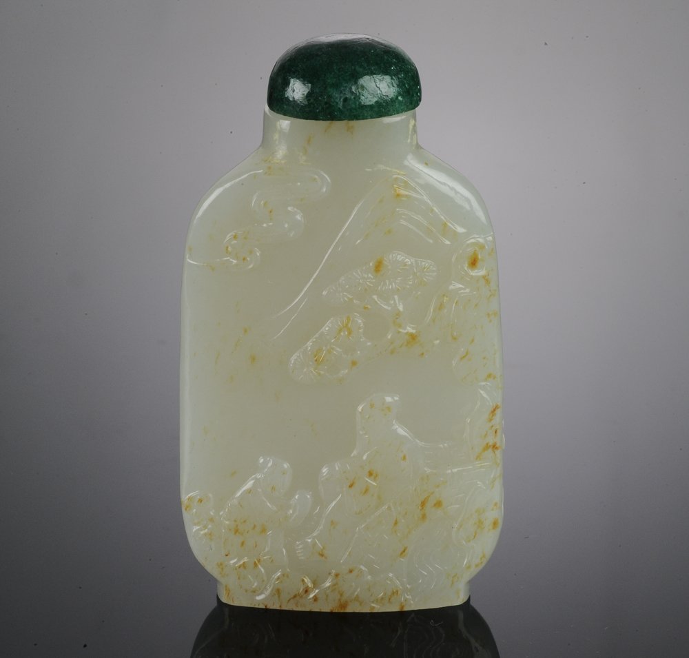 A Flat White Jade Snuff Bottle with Brown Skin (1 of 9)