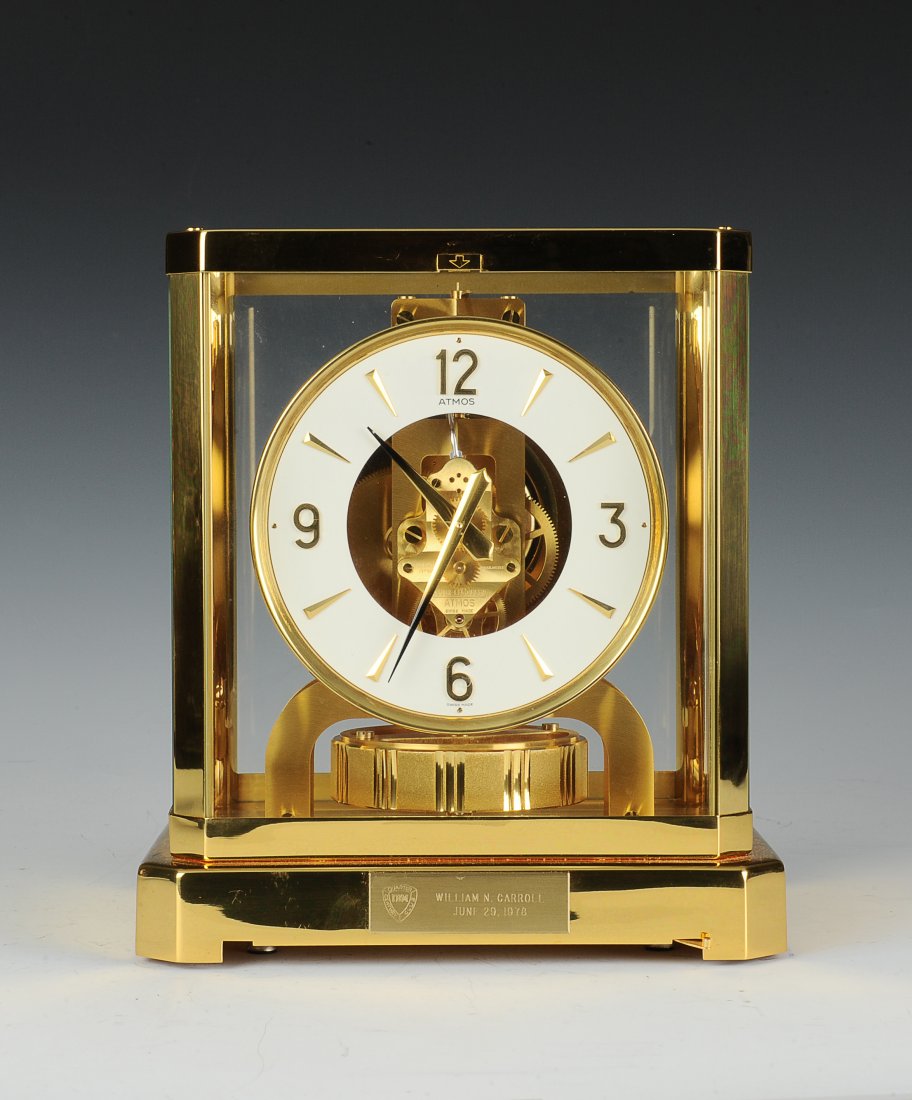 Jaeger-LeCoultre Atmos Clock, Circa 1970: This elegant perpetual motion clock is Swiss made by Jaeger-LeCoultre. It is part of their Atmos collection and is the Caliber 528-8 model, which was produced between 1960 and 1980. The clock has a br