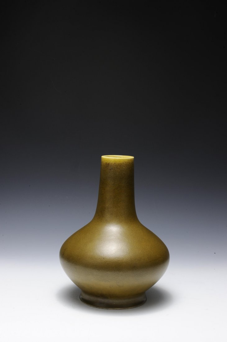Imperial Teadust Vase, Guangxu Mark & Period: Imperial teadust glaze tianqiuping from the Guangxu Period. This globular vase has a thick neck and an even olive tone teadust glaze. The base has a 6 character Guangxu mark. Dimensions are 9 inches w