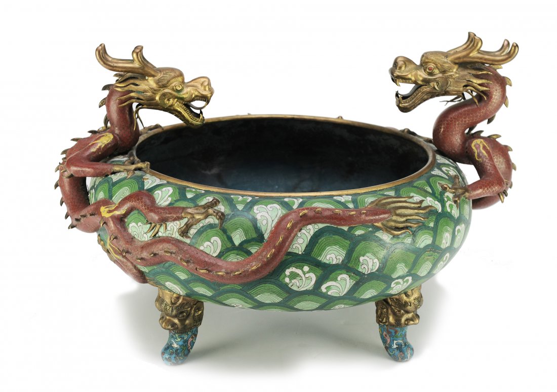 Large Two Dragon Cloisonné Incense Burner: Large Chinese dragon cloisonné incense burner from the early 20th century. This incense burner features a bowl of green and white enamel waves, sitting atop four chilong head legs, with their tongues