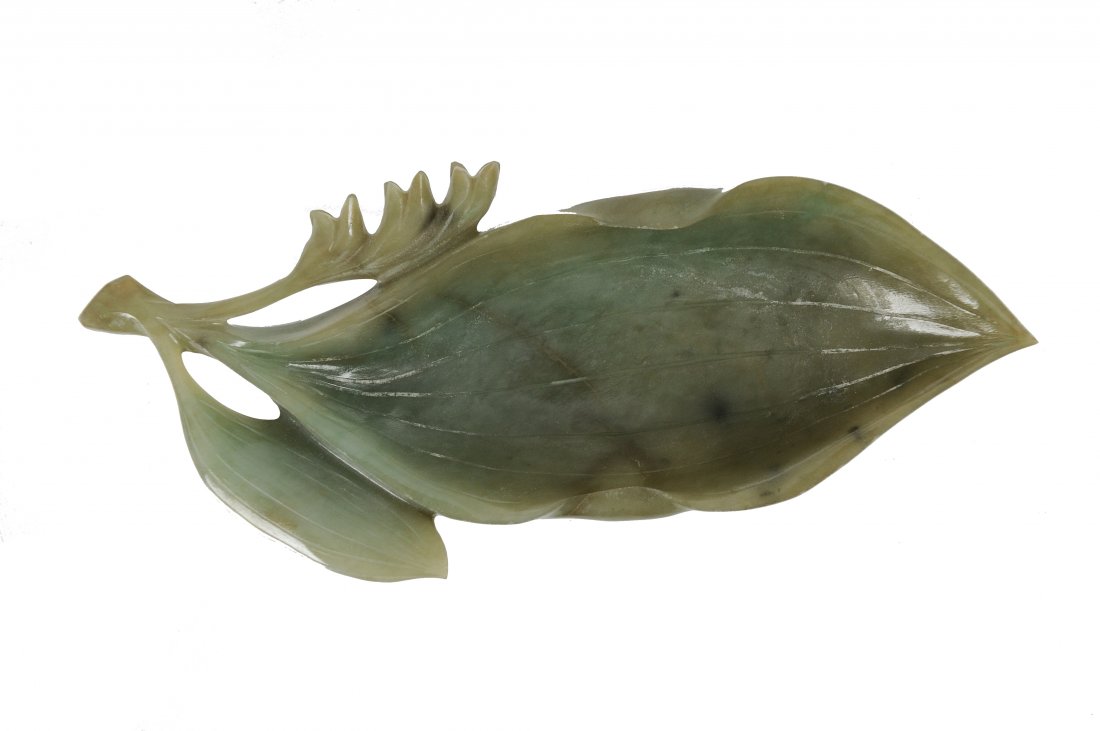 Jade Leaf Form Brush Washer, 19th Century: Chinese green jade leaf form brush washer from the 19th century. This brush washer is carved in a leaf shape. It is 7 1/2 inches wide by 1 1/8 inches high. All measurements are approximate. All measur