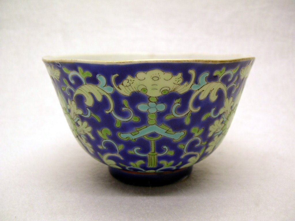 Small Famille Rose Bowl Daoguang Period #la105c: Finely decorated in famille-rose glaze on blue ground with Buddhist flower motifs, Daoguang red seal mark and of the period, normal glaze wear, good condition, 4" dia.