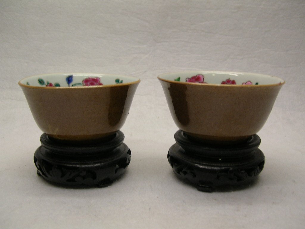 Pair of Brown Glaze Porcelain Cups 18th C. #la270srb: A pair of Chinese brown glazed porcelain cups, the interior decorated in famille-rose palette of floral motifs, 18th century, Yongzheng period, with wooden bases, good condition, 3 1/4" wide