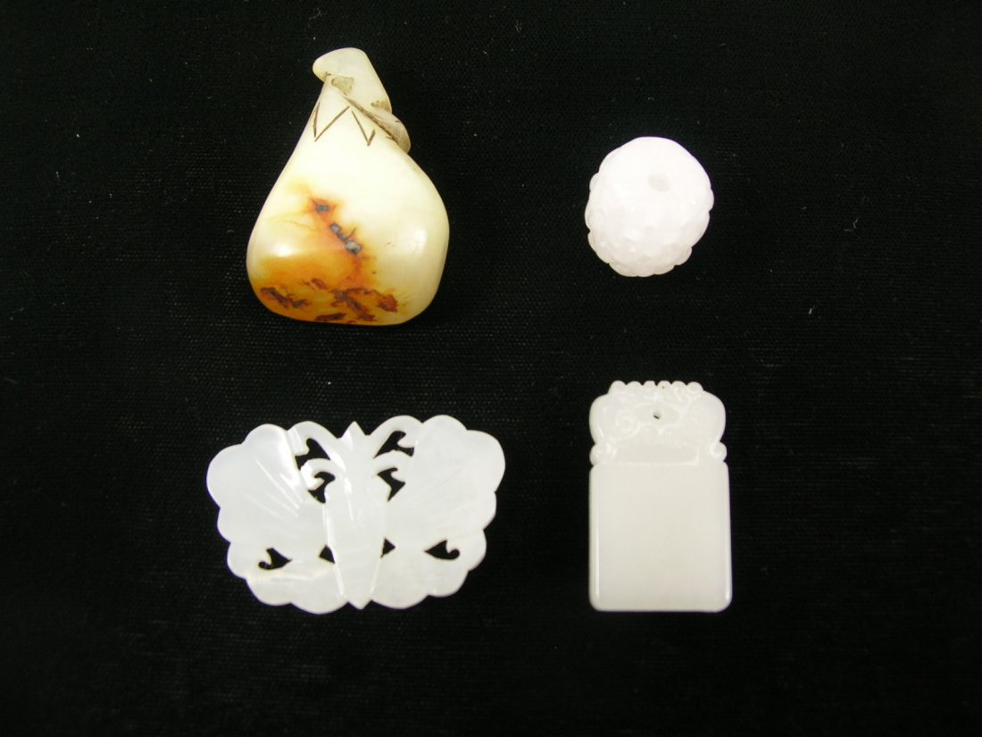Four Chinese Small Carved Jade Pendants (1 of 10)