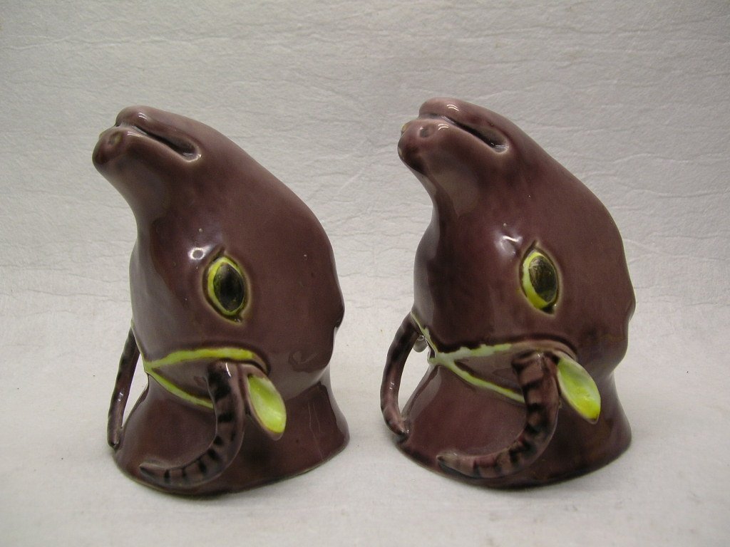 Pair of Chinese Aubergine Glaze Bull-Head Cups Qing Dy: A pair of very unique Chinese aubergine glazed porcelain bull-head cups, 18th / 19th century, Qing dynasty, good condition, minor glaze wear, from a private Upper West Side collection, 4 1/2" high