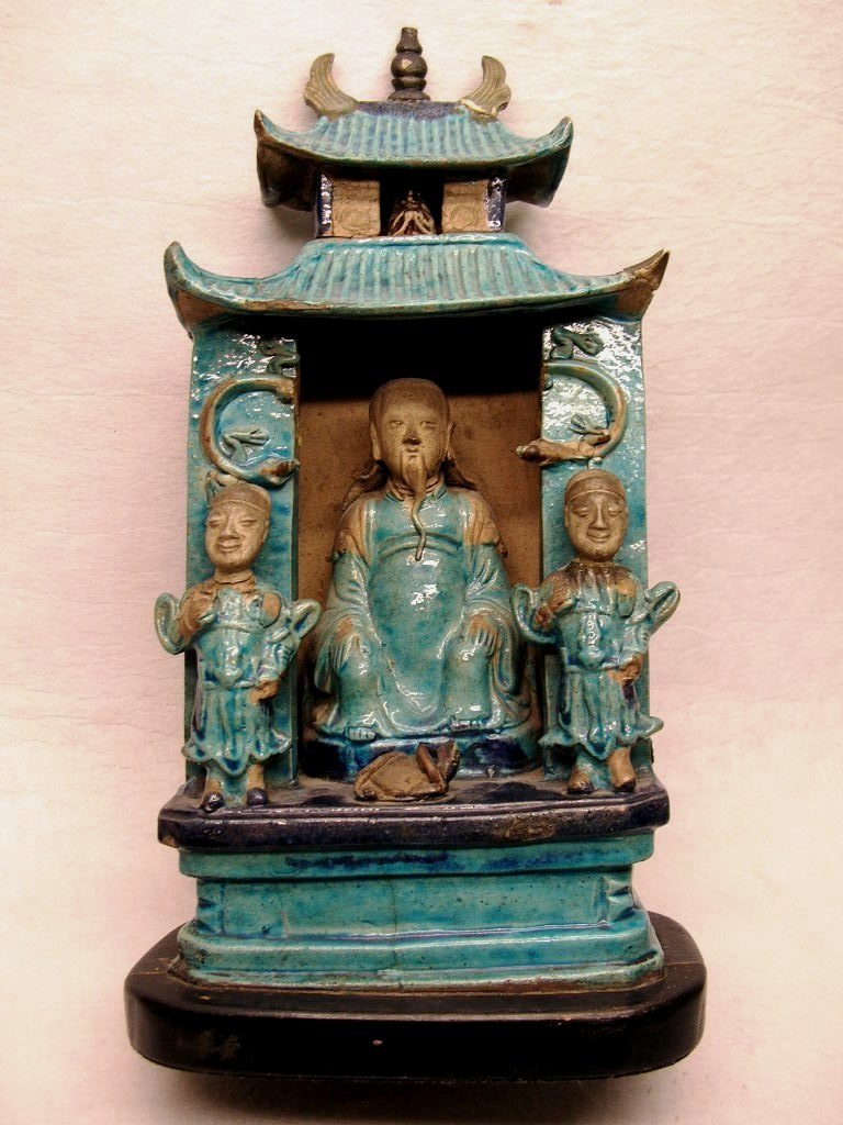 Unusual Ming Dynasty Fahua Glaze Zhengwu Niche: An unusual Chinese Fahua / turquoise glazed pottery niche depicting Taoist deity Zhengwu and his acolytes, Ming Dynasty, some losses and restorations, from a private New York City collection, 12 1/4\"