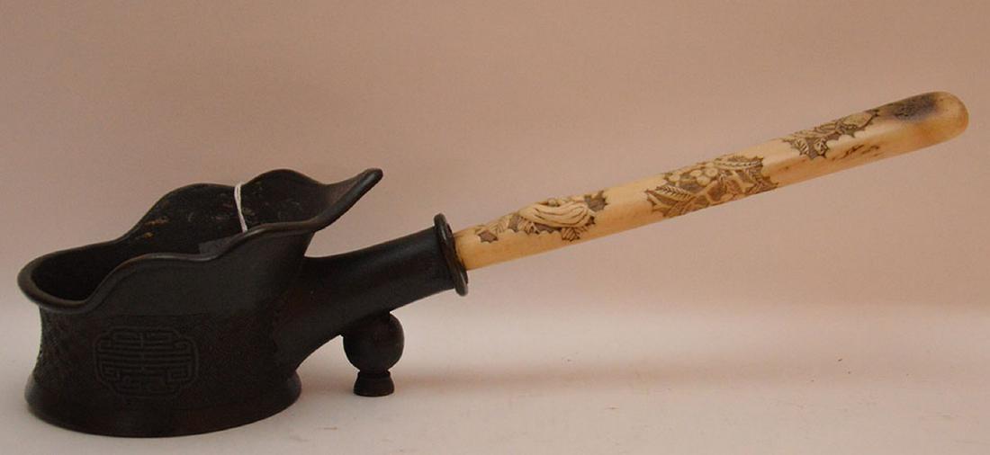 Antique Bronze Chinese Pot with carved bone handle.: Antique Bronze Chinese Pot with carved bone handle. Lth 15"