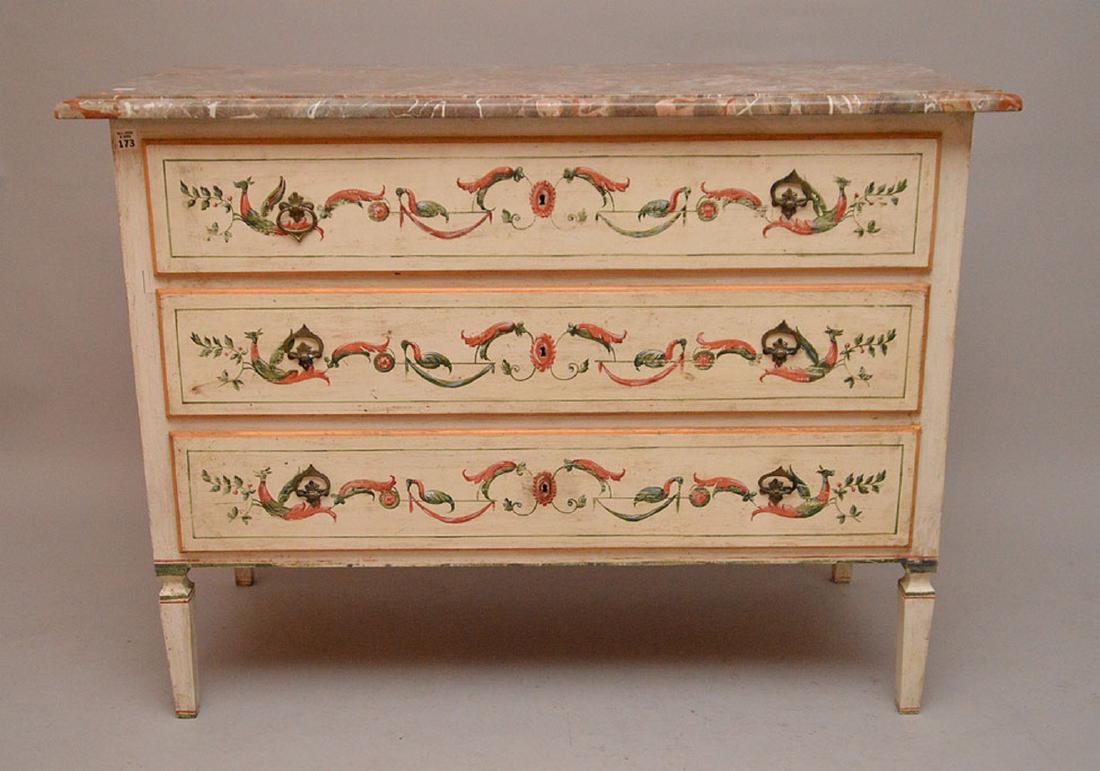 3 drawer painted commode with scrolling foliate design: 3 drawer painted commode with scrolling foliate design of red & greens on cream ground, 33"h x 43"w x 19 1/2"d