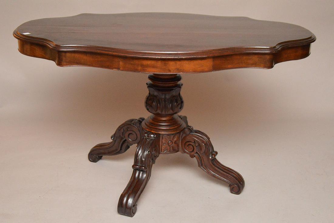 Turtle top Victorian table with 2 drawers on carved (1 of 4)