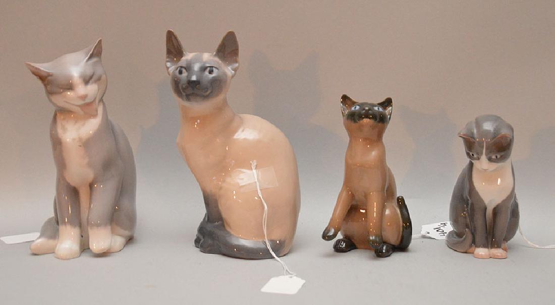 4 Porcelain Cats; 1 Royal Copenhagen Ht. 8", 1 B & G: 4 Porcelain Cats; 1 Royal Copenhagen Ht. 8", 1 B & G Cat Ht. 7 1/2", 2 B & G Cats Ht. 5"