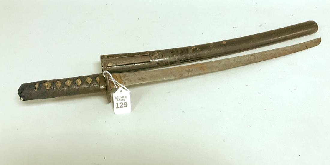 Antique Samurai Sword the handle with skin covered by (1 of 5)