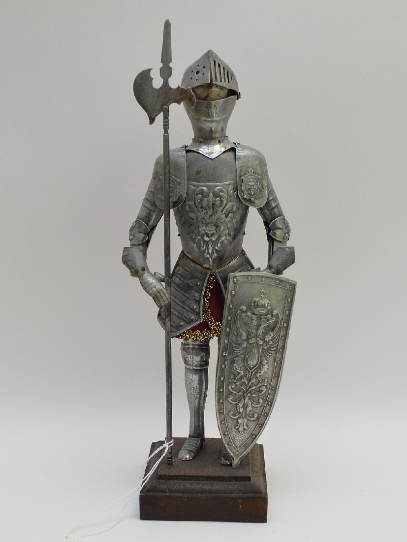 Antique Knight in suite of armor with porcelain face.: Antique Knight in suite of armor with porcelain face. Ht. 14 1/2"