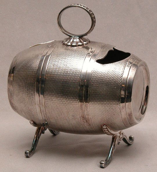 Silver plate spoon warmer in the form of a keg on: Silver plate spoon warmer in the form of a keg on scrolling legs, 6"h x 6"L