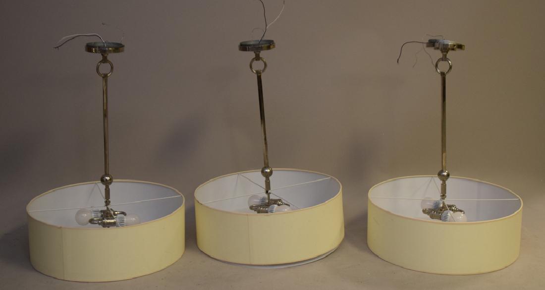 3 modern chandeliers, hanging disc form, parchment (1 of 3)