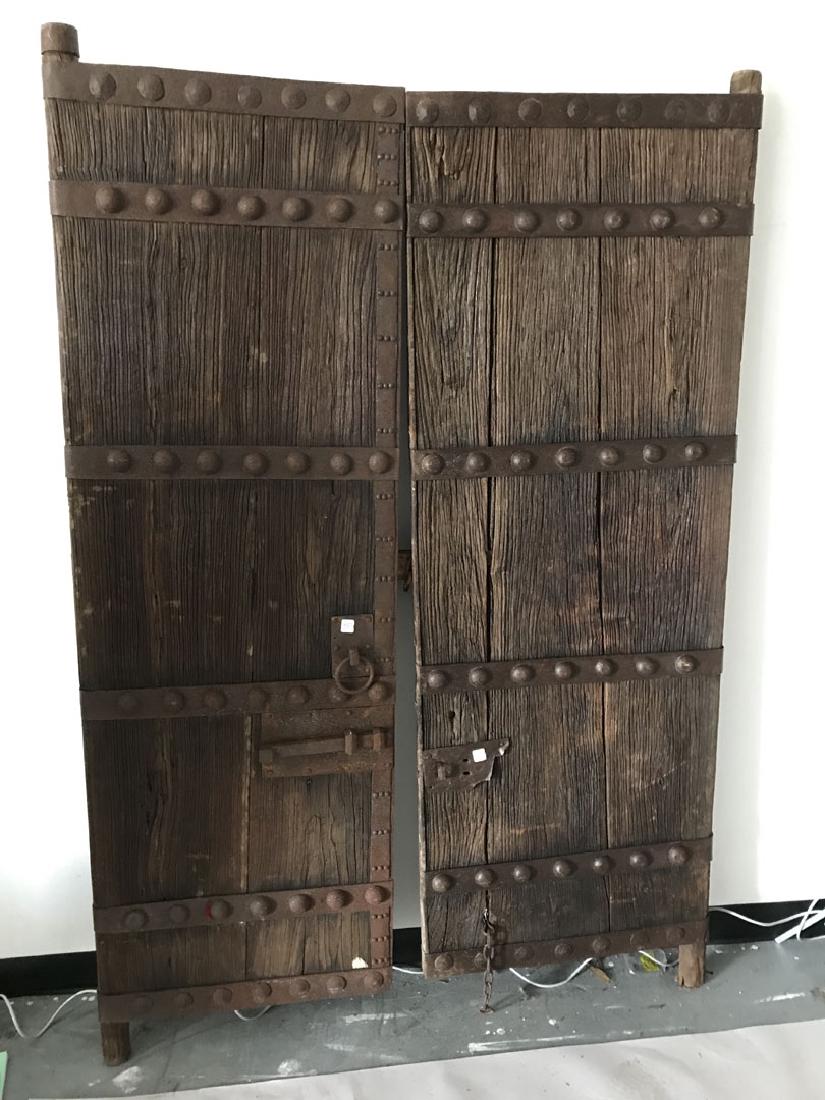 Pair primitive doors with original iron hardware, 76h x (1 of 8)