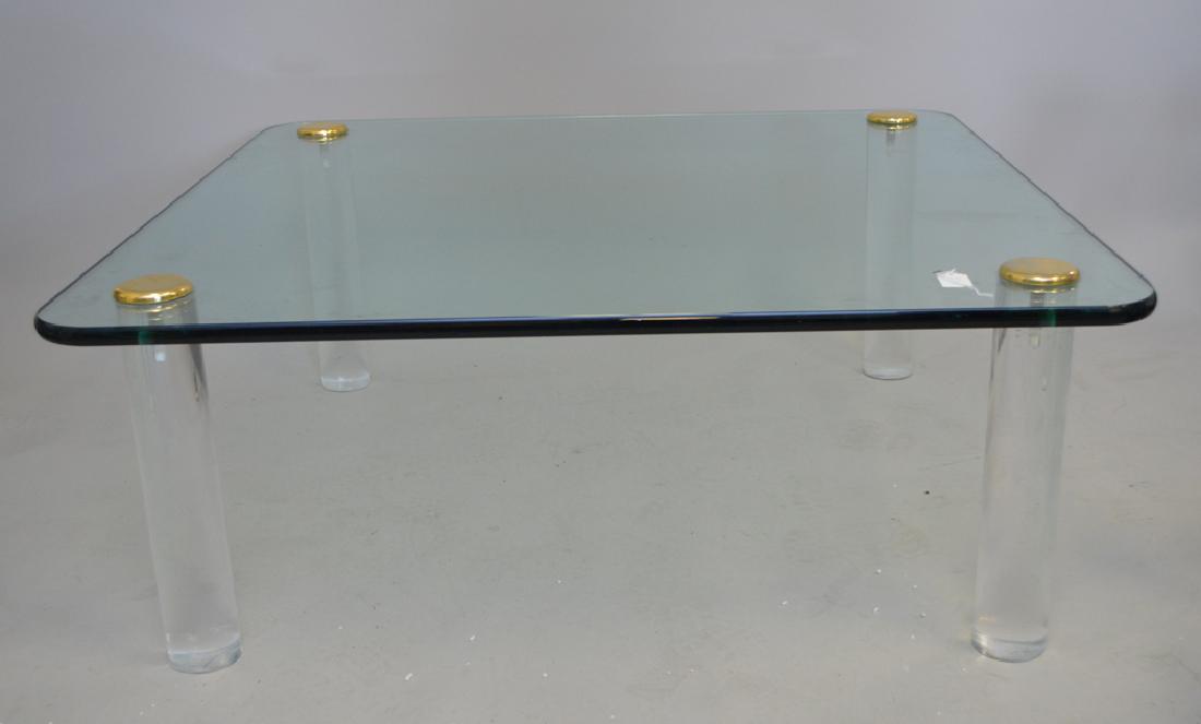 Glass coffee table with Lucite legs (1 of 3)