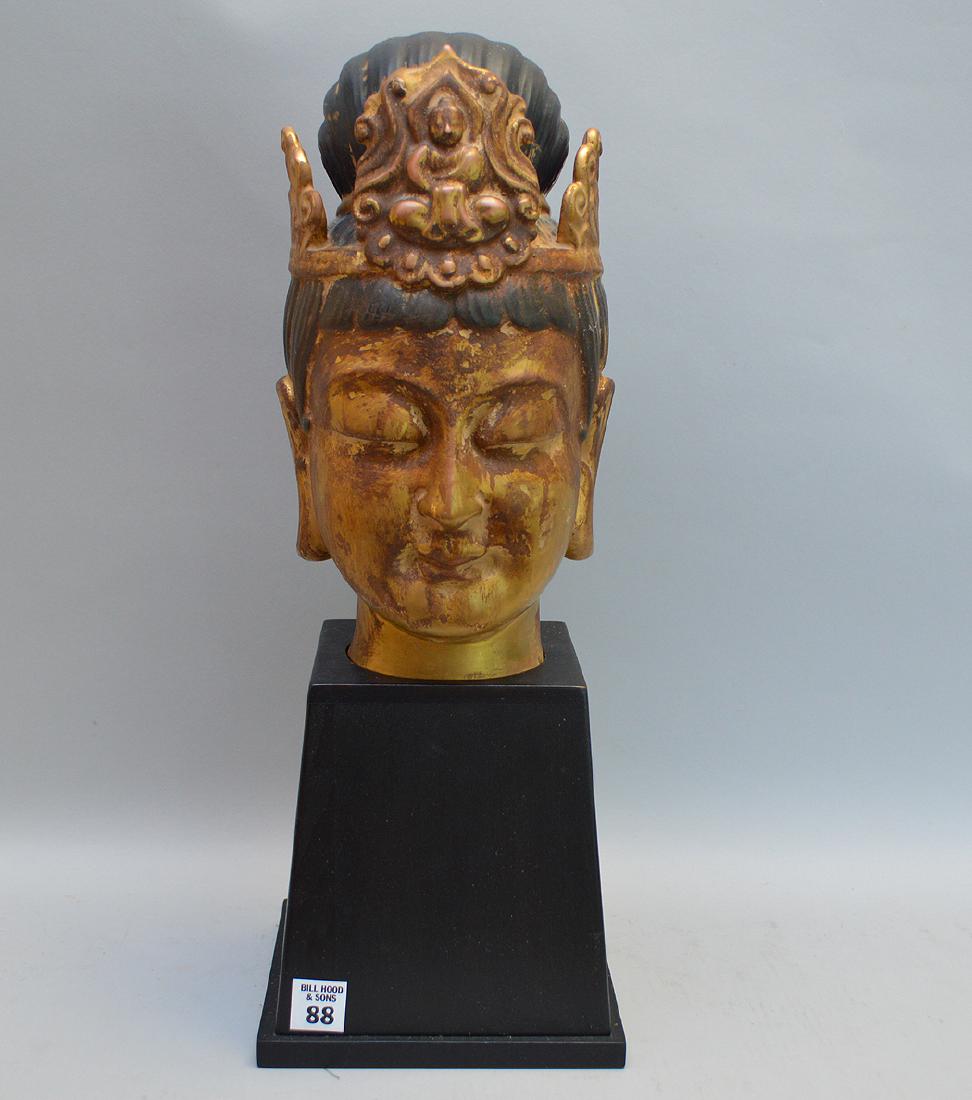 Gilded ceramic buddha head with black wood base (1 of 9)