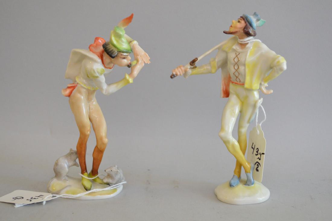 2 Hutchenreuther figures, musician serenading 2: 2 Hutchenreuther figures, musician serenading 2 squirrels (5 1/2"h) and gentleman with sword (5 1/2"h) as is small feather break