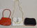 Lot of Three Handbags; (1) La Bagagerie, Brick-colored