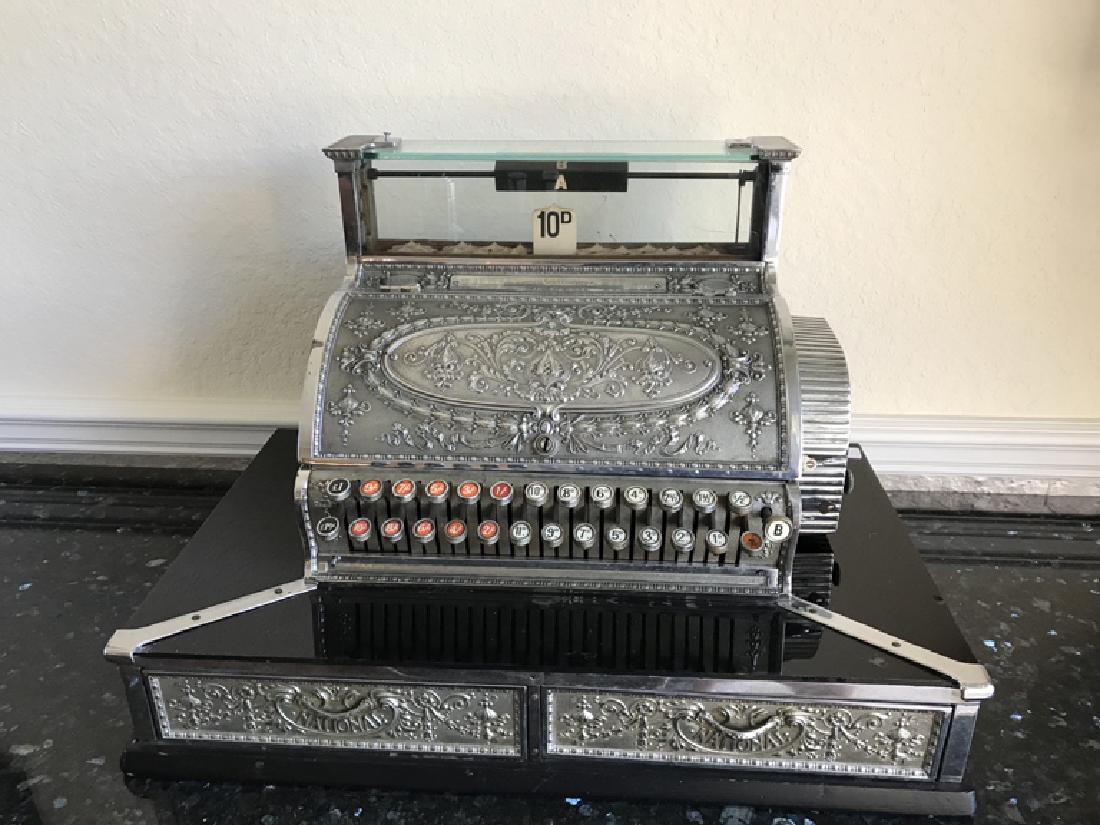 National Cash register, 19"h x 26"w x 15 1/2"d, Silver: National Cash register, 19"h x 26"w x 15 1/2"d, Silver standard in pounds