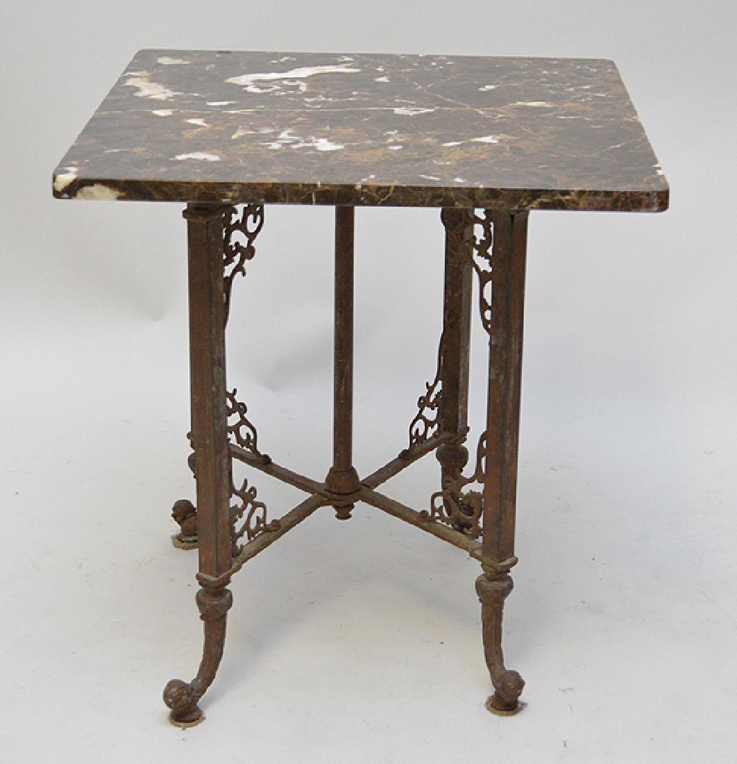 Iron base table with brown marble top, 21"h x 20"w: Iron base table with brown marble top, 21"h x 20"w