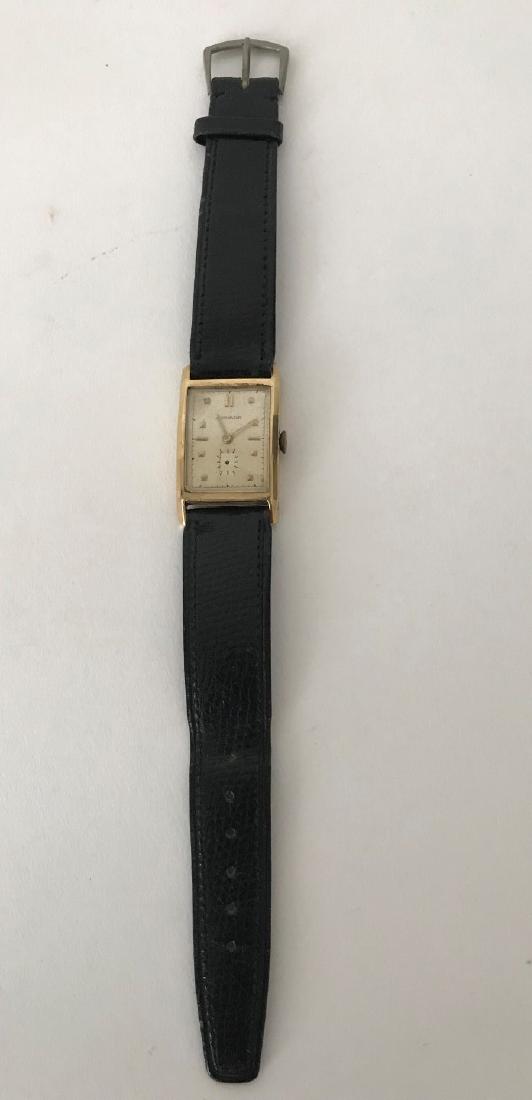 Men's 14K Yellow Gold Movado Watch with leather strap. (1 of 2)