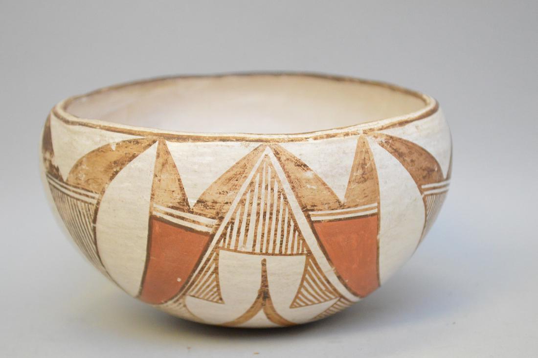 Polychrome Native American Pueblo Pottery Bowl -: Polychrome Native American Pueblo Pottery Bowl - Globular bowl with orange & black on white. Possibly early 1900's. 6" dia x 3 1/2"h Condition: Good with no cracks or chips, some fading to paint consi