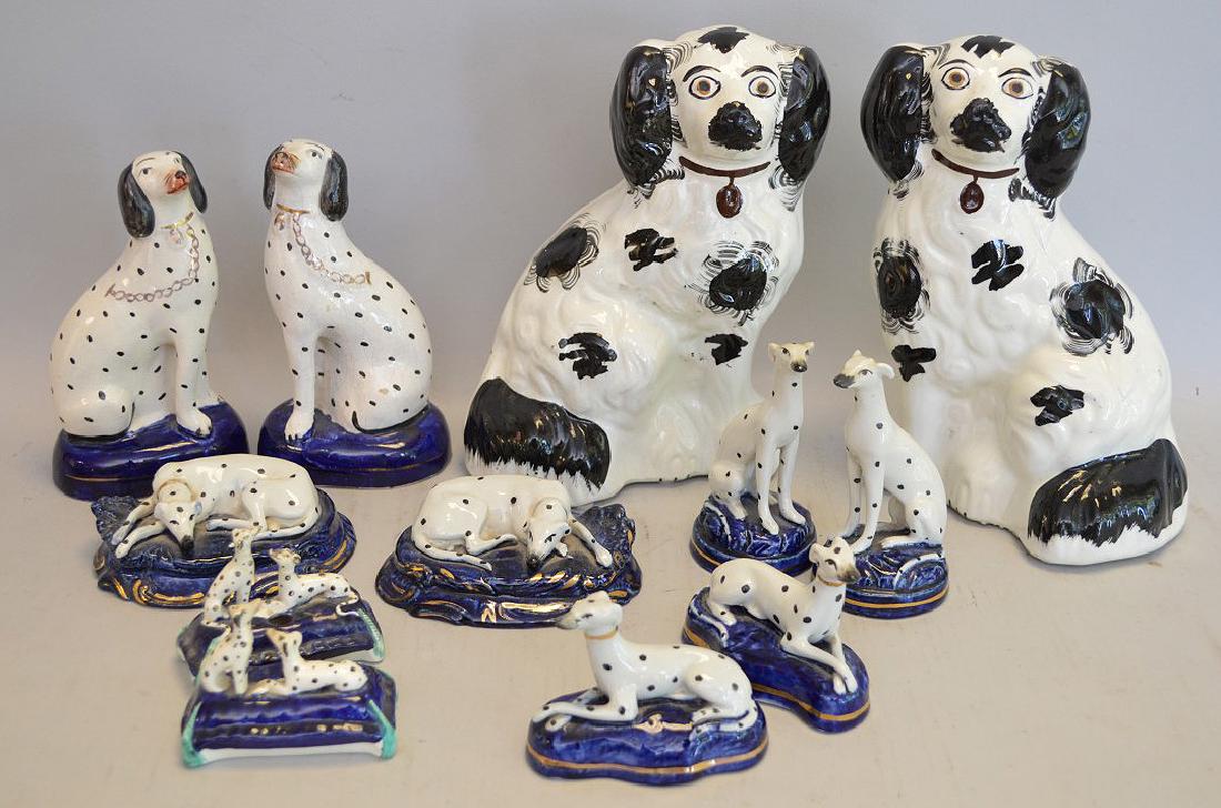 Collection of 12 Antique "Staffordshire" Porcelain: Collection of 12 Antique "Staffordshire" Porcelain Spotted Dogs - Lot includes 6 mirrored pairs of dogs. None of the dogs have makers marks. Dimensions: Largest 8 3/8" H, smallest (two dogs on a pillo