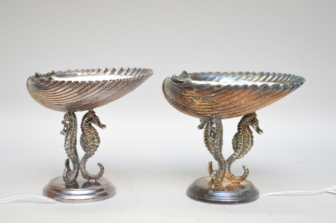 Pair of .800 Silver-Clad Sea Shells standing on Sea: Pair of .800 Silver-Clad Sea Shells standing on Sea Horse Supports - Marked with an oval cartouche with a star & 970 Roma mark, a 800 mark, as well as a "RM" maker mark. Features a silver coated natur