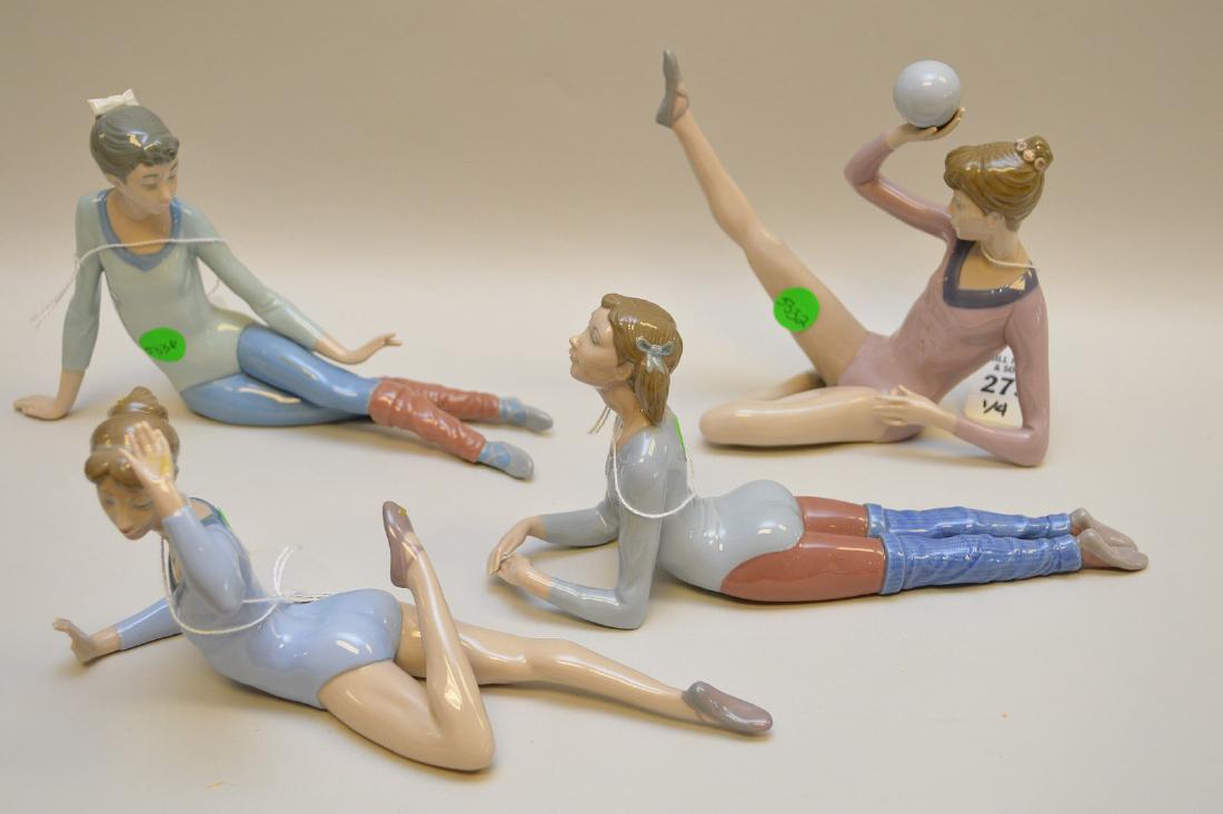 Lot of FOUR Lladro Spain Porcelain Sculptures: (1/4): Lot of FOUR Lladro Spain Porcelain Sculptures: (1/4) “Gymnast Balancing Ball” #5332, Measures approx. Ht. 6” W.6” D. 2.5”; (2/4) “Aerobic Scissors” #5336, Measures approx. Ht. 6” W. 9.