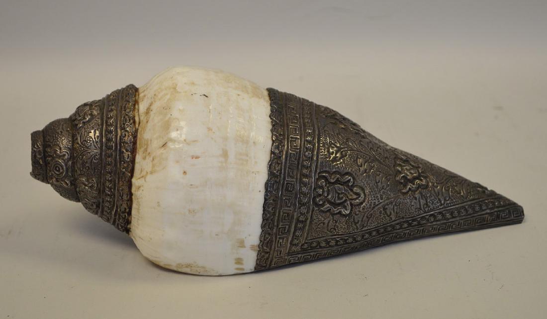 EARLY TIBETAN RITUAL SHELL HORN WITH SILVER OVERLAY. (1 of 6)