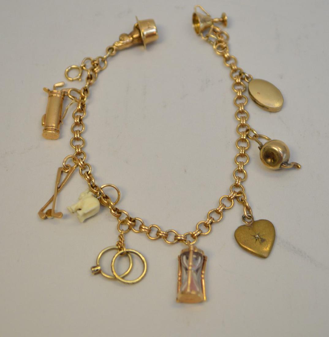 14k YELLOW GOLD CHARM BRACELET, wt 15.6 grams some (1 of 3)
