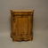 Light wood French serpentine cabinet with gilt metal