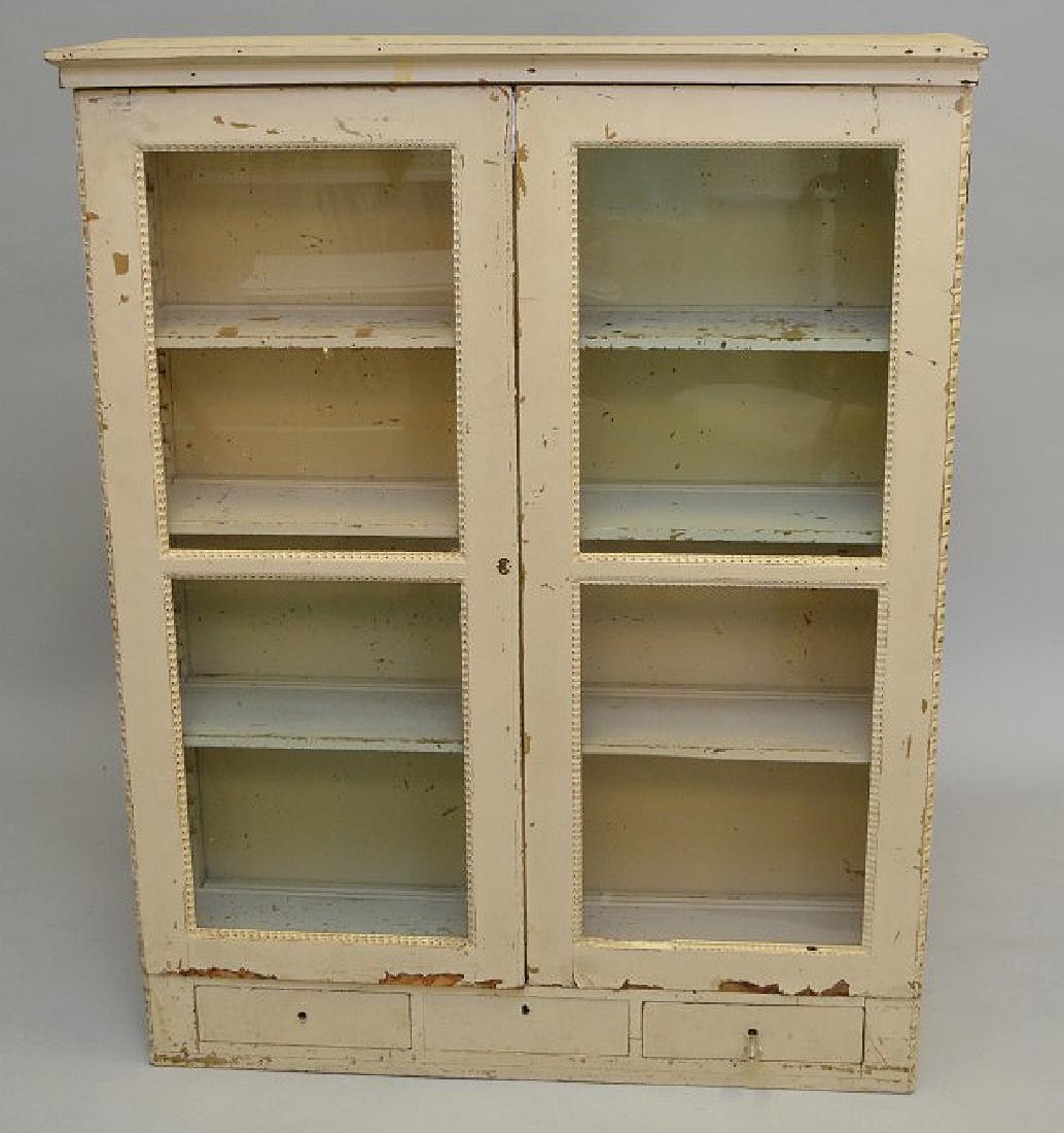 Chippy white bookcase, 2 glass doors over 3 drawers, (1 of 5)