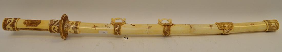 Carved & Etched Bone Sword & Sheath. Condition: good: Carved & Etched Bone Sword & Sheath. Condition: good with only minor normal wear. Lth. 33 1/2"