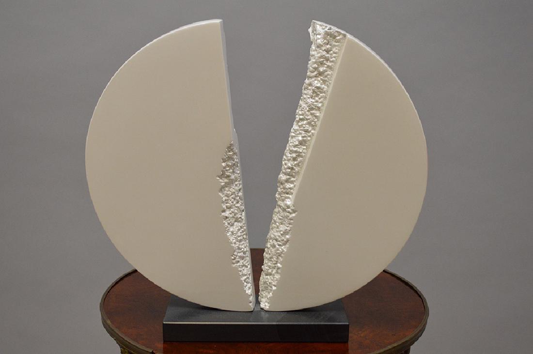 Metal Sculpture by James C. Myford, painted white,: Metal Sculpture by James C. Myford, painted white, marked '93 3/6, titled- DISK, 14 tall x 16.5 wide inches , good condition with a noticeable chip