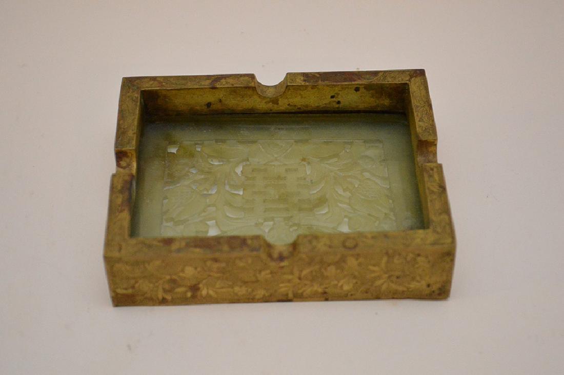 Chinese Hand Carved Jade Gilt Ashtray. The jade plaque: Chinese Hand Carved Jade Gilt Ashtray. The jade plaque depicts a large bat and double happiness symbols with floral motif. The base is also ornately etched and lined with clear glass. Marked China-190