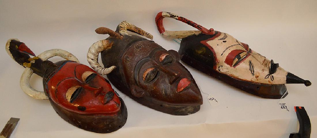Lot of 4 African mask. 3 carved wood & one woven fabric (1 of 10)