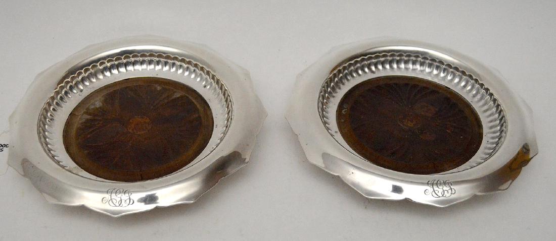 Pair Tiffany Sterling & Carved Wood Wine Coasters.: Pair Tiffany Sterling & Carved Wood Wine Coasters. Condition: Minor normal wear. Dia. 7"