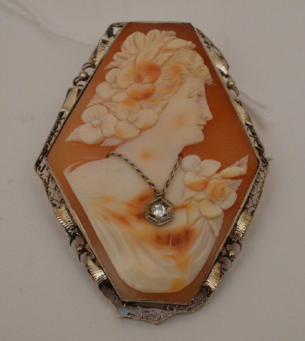 14k White Gold Cameo with Diamond Pendant Brooch . Size: 14k White Gold Cameo with Diamond Pendant Brooch . Size 2.25" x 1.5" Condition good normal wear